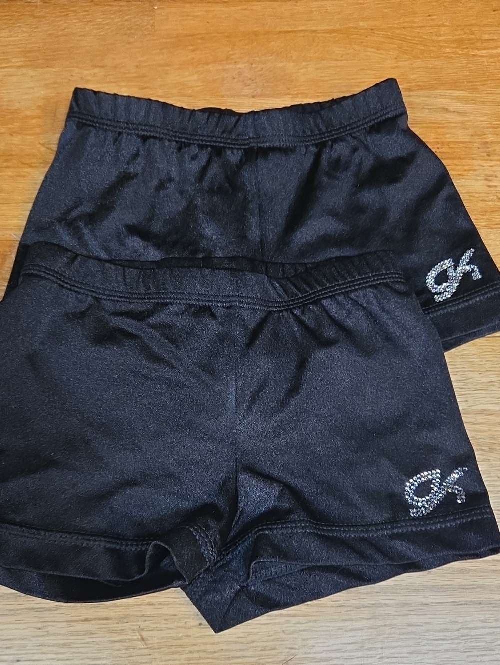 2 Pairs Of GK Black Rhinestone Logo Performance Shorts